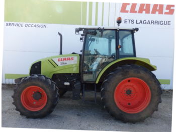 Tracteur agricole Claas AXOS 310: photos 1